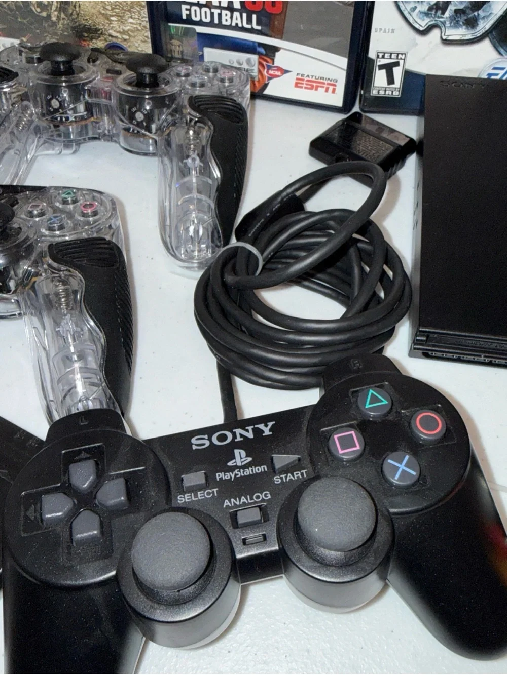 Sony PlayStation 2 Slim Console Bundle in Black with games and Controllers